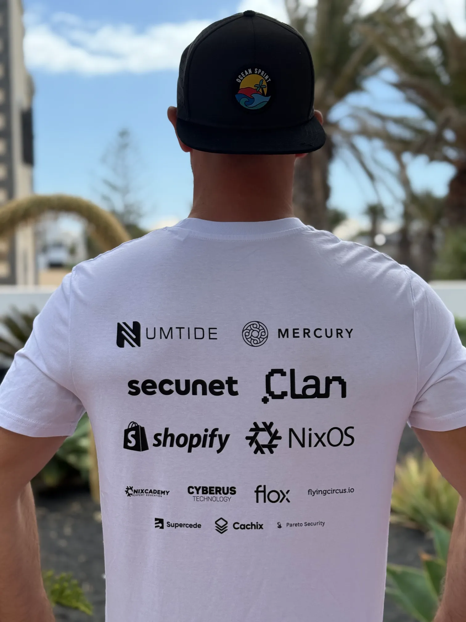 The back of the OceanSprint 2025 t-shirt with a list of all the sponsors